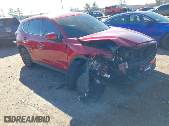 2019 Mazda CX-5 Sport with VIN JM3KFBBM2K0508743, listed as a IAAI auction lot 41288659 with 77,710 mi miles and . Bid and sale history available at DreamBid. Image 1.