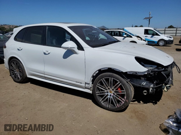 2016 Porsche Cayenne GTS with VIN WP1AD2A20GLA76054, listed as a Copart auction lot 55176615 with 54,274 mi miles and Salvage title. Bid and sale history available at DreamBid. Image 4.