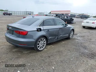 2015 Audi A3 Premium Plus z VIN WAUCCGFF6F1135248, wystawiony jako IAAI lot #42077767 z przebiegiem 75 806 mil mil oraz . Historia ofert i sprzedaży dostępna na DreamBid. Obrazek 4.