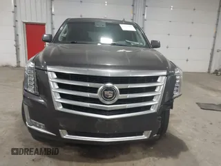 2015 Cadillac Escalade Premium z VIN 1GYS4CKJ8FR308617, wystawiony jako IAAI lot #41974608 z przebiegiem 154 014 mil mil oraz . Historia ofert i sprzedaży dostępna na DreamBid. Obrazek 12.