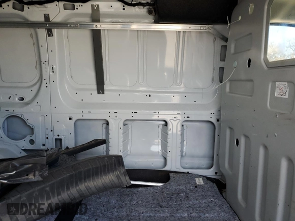 2023 Ford Transit Cargo with VIN 1FTBR1Y88PKA97221, listed as a Copart auction lot 43410475 with 34,927 mi miles and Salvage Title. Bid and sale history available at DreamBid. Image 11.