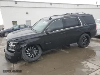 2019 Chevrolet Tahoe LT with VIN 1GNSKBKC7KR306530, listed as a Copart auction lot 42024765 with 122,249 mi miles and Salvage Title. Bid and sale history available at carsss.com. Image 1.