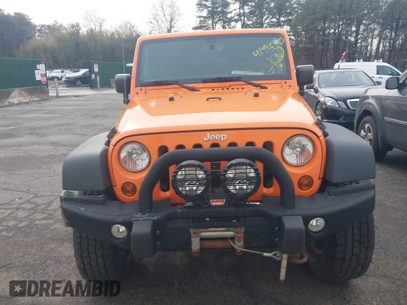 2013 Jeep Wrangler Unlimited Sport z VIN 1C4BJWDG7DL522421, wystawiony jako IAAI lot #41492425 z przebiegiem 55 921 mil mil oraz . Historia ofert i sprzedaży dostępna na DreamBid. Obrazek 12.
