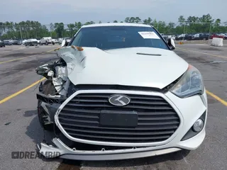 2013 Hyundai Veloster Turbo z VIN KMHTC6AE6DU112233, wystawiony jako IAAI lot #42295962 z przebiegiem 151 091 mil mil oraz . Historia ofert i sprzedaży dostępna na DreamBid. Obrazek 6.