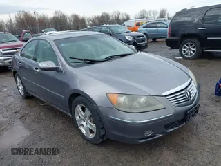2006 Acura RL z VIN JH4KB165X6C006938, wystawiony jako IAAI lot #41936024 z przebiegiem 235 390 mil mil oraz . Historia ofert i sprzedaży dostępna na DreamBid. Obrazek 6.