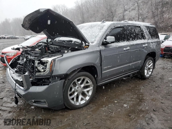 2020 GMC Yukon Denali with VIN 1GKS2CKJ3LR289504, listed as a Copart auction lot 77965694 with 0 mi miles and Salvage Title. Bid and sale history available at carsss.com. Image 1.
