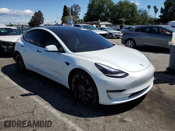 2022 Tesla Model 3 Performance with VIN 5YJ3E1EC7NF248083, listed as a Copart auction lot 51536925 with 50,529 mi miles and Salvage Title. Bid and sale history available at DreamBid. Image 4.