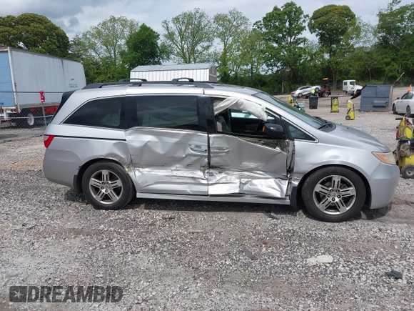 2012 Honda Odyssey Touring с VIN 5FNRL5H90CB083157, выставлен на аукционе IAAI как лот 42176609 с пробегом 250 000 миль миль и . История ставок и продаж доступна на DreamBid. Изображение 13.