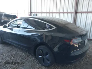 2019 Tesla Model 3 Mid Range with VIN 5YJ3E1EA4KF399151, listed as a IAAI auction lot 41840425 with Not Provided miles and . Bid and sale history available at DreamBid. Image 3.