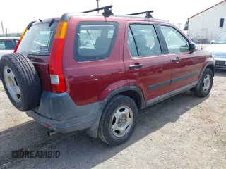2004 Honda CR-V LX with VIN SHSRD68474U203411, listed as a IAAI auction lot 42125517 with 185,000 mi miles and . Bid and sale history available at carsss.com. Image 4.