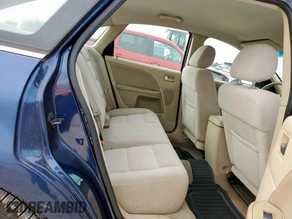 2005 Ford Five Hundred SE z VIN 1FAFP23135G175790, wystawiony jako Copart lot #56588085 z przebiegiem 117 354 mil mil oraz Szkody całkowita. Historia ofert i sprzedaży dostępna na DreamBid. Obrazek 10.