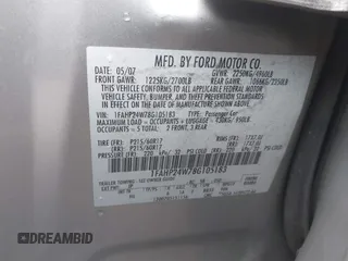 2008 Ford Taurus SEL with VIN 1FAHP24W78G105183, listed as a IAAI auction lot 41441086 with 215,758 mi miles. Bid and sale history available at carsss.com. Image 9.