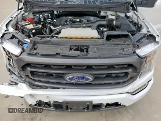2023 Ford F-150 XL с VIN 1FTEW1CPXPKF70427, выставлен на аукционе Copart как лот 59579585 с пробегом 23 217 миль миль и Списание • Salvage title. История ставок и продаж доступна на DreamBid. Изображение 11.