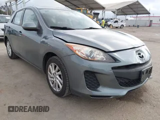 2012 Mazda Mazda3 i Touring with VIN JM1BL1L84C1671872, listed as a IAAI auction lot 42116842 with 85,343 mi miles. Bid and sale history available at carsss.com. Image 1.