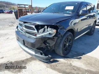 2013 Dodge Durango SXT with VIN 1C4RDJAG2DC530407, listed as a IAAI auction lot 41837441 with 133,375 mi miles and . Bid and sale history available at DreamBid. Image 6.