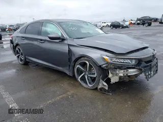 2018 Honda Accord Sedan Sport 1.5T with VIN 1HGCV1F37JA178989, listed as a IAAI auction lot 41209303 with 145,928 mi miles. Bid and sale history available at carsss.com. Image 1.