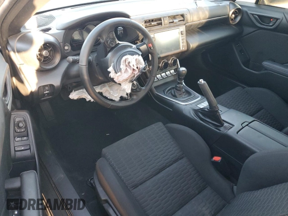2023 Toyota 86 z VIN JF1ZNBB11P9765420, wystawiony jako Copart lot #48725015 z przebiegiem 12 979 mil mil oraz Szkoda całkowita • Salvage title. Historia ofert i sprzedaży dostępna na DreamBid. Obrazek 8.