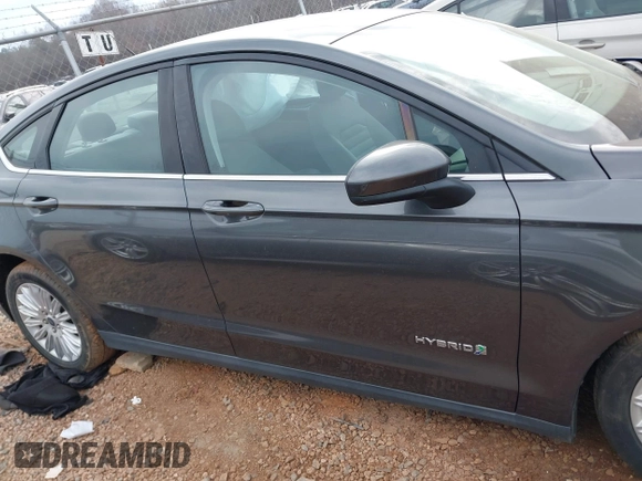 2015 Ford Fusion S Hybrid with VIN 3FA6P0UU7FR167229, listed as a IAAI auction lot 41684934 with 135,317 mi miles. Bid and sale history available at carsss.com. Image 13.