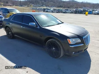2011 Chrysler 300 with VIN 2C3CA6CT0BH563149, listed as a IAAI auction lot 41745043 with 195,000 mi miles. Bid and sale history available at carsss.com. Image 1.
