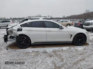 2017 BMW 4 Series 430i xDrive z VIN WBA4F9C54HG791712, wystawiony jako IAAI lot #41554381 z przebiegiem 106 013 mil mil oraz . Historia ofert i sprzedaży dostępna na DreamBid. Obrazek 13.