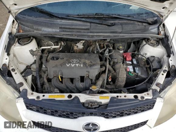 2006 Scion xA z VIN JTKKT624065002595, wystawiony jako Copart lot #73732864 z przebiegiem 198 897 mil mil oraz Szkoda całkowita • Salvage title. Historia ofert i sprzedaży dostępna na DreamBid. Obrazek 11.