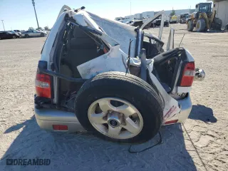 1998 Kia Sportage with VIN KNDJB7232W5569054, listed as a Copart auction lot 82756824 with 106,550 mi miles and Salvage Title. Bid and sale history available at carsss.com. Image 6.