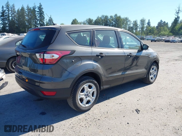 2018 Ford Escape S with VIN 1FMCU0F75JUD05716, listed as a IAAI auction lot 42733113 with 69,469 mi miles and . Bid and sale history available at DreamBid. Image 4.