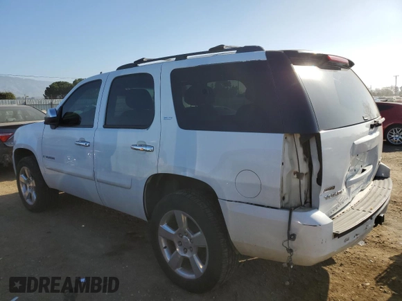 2008 GMC Yukon SLT 4SA z VIN 1GKFK13028J192313, wystawiony jako Copart lot #89207235 z przebiegiem 240 812 mil mil oraz Szkoda całkowita • Salvage title. Historia ofert i sprzedaży dostępna na DreamBid. Obrazek 2.