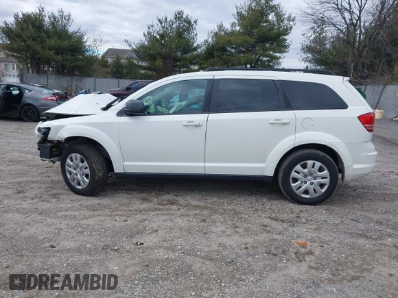 2016 Dodge Journey SE with VIN 3C4PDCAB1GT104630, listed as a IAAI auction lot 41731485 with 233,992 mi miles. Bid and sale history available at carsss.com. Image 12.