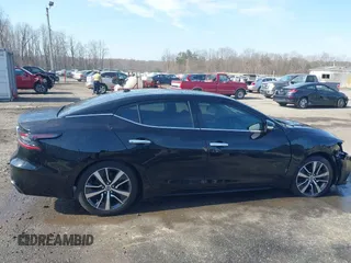 2019 Nissan Maxima SV with VIN 1N4AA6AV8KC371882, listed as a IAAI auction lot 41779671 with 107,296 mi miles and . Bid and sale history available at DreamBid. Image 14.