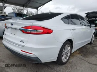 2020 Ford Fusion SE z VIN 3FA6P0LU6LR113532, wystawiony jako IAAI lot #41794966 z przebiegiem 50 128 mil mil oraz . Historia ofert i sprzedaży dostępna na DreamBid. Obrazek 4.