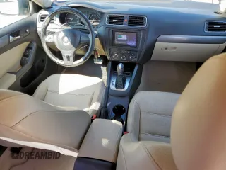 2013 Volkswagen Jetta TDI w/Premium z VIN 3VWLL7AJ7DM232096, wystawiony jako Copart lot #57265725 z przebiegiem 120 361 mil mil oraz Szkoda całkowita • Salvage title. Historia ofert i sprzedaży dostępna na DreamBid. Obrazek 8.