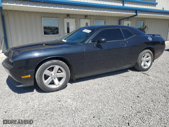 2009 Dodge Challenger SE with VIN 2B3LJ44V49H542199, listed as a Copart auction lot 50326325 with 124,536 mi miles and Salvage Title. Bid and sale history available at carsss.com. Image 1.