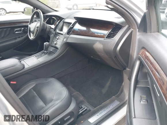 2015 Ford Taurus Limited with VIN 1FAHP2F8XFG180200, listed as a IAAI auction lot 41897113 with Not provided miles and . Bid and sale history available at DreamBid. Image 5.