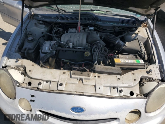 1997 Ford Taurus GL with VIN 1FALP5228VG222228, listed as a Copart auction lot 64806845 with 160,397 mi miles and Salvage title. Bid and sale history available at DreamBid. Image 11.