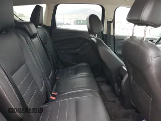 2013 Ford Escape SEL z VIN 1FMCU9H91DUA34614, wystawiony jako Copart lot #61978405 z przebiegiem 103 218 mil mil oraz Czysty tytuł • Clean title. Historia ofert i sprzedaży dostępna na DreamBid. Obrazek 10.