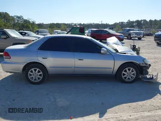 2002 Honda Accord SE z VIN 1HGCG66852A067989, wystawiony jako IAAI lot #41868854 z przebiegiem 177 905 mil mil oraz . Historia ofert i sprzedaży dostępna na DreamBid. Obrazek 13.