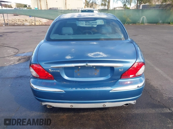 2002 Jaguar X-Type with VIN SAJEA51C42WC11103, listed as a IAAI auction lot 41699366 with 106,418 mi miles and . Bid and sale history available at DreamBid. Image 13.