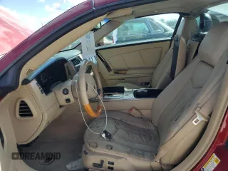 2009 Cadillac XLR Platinum z VIN 1G6YV36A595600621, wystawiony jako Copart lot #75302454 z przebiegiem Nie podano mil oraz Szkody całkowita. Historia ofert i sprzedaży dostępna na DreamBid. Obrazek 7.