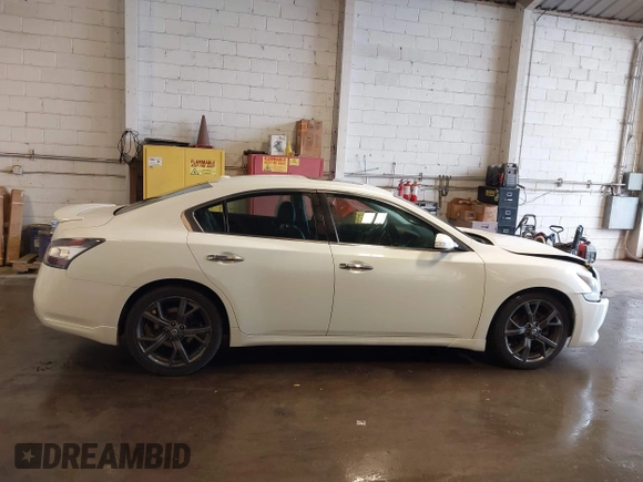 2013 Nissan Maxima SV with VIN 1N4AA5AP6DC804257, listed as a IAAI auction lot 42264222 with 206,818 mi miles and . Bid and sale history available at DreamBid. Image 13.