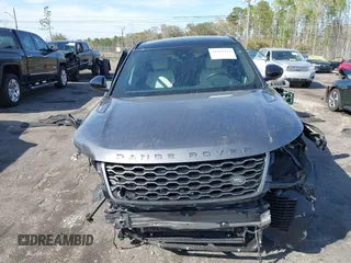 2019 Land Rover Range Rover Velar R-Dynamic SE z VIN SALYL2EXXKA210087, wystawiony jako IAAI lot #41801144 z przebiegiem 52 758 mil mil oraz . Historia ofert i sprzedaży dostępna na DreamBid. Obrazek 13.