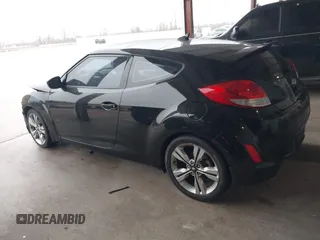 2017 Hyundai Veloster Value Edition with VIN KMHTC6AD6HU321999, listed as a IAAI auction lot 41611017 with 99,382 mi miles. Bid and sale history available at carsss.com. Image 14.