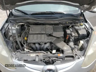 2013 Mazda 2 Touring z VIN JM1DE1LZ5D0162425, wystawiony jako Copart lot #59033595 z przebiegiem 225 932 mil mil oraz Szkoda całkowita • Salvage title. Historia ofert i sprzedaży dostępna na DreamBid. Obrazek 11.