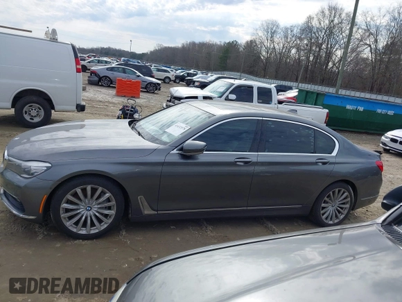 2017 BMW 7 Series 740i with VIN WBA7E2C54HG740170, listed as a IAAI auction lot 41432578 with 110,893 mi miles and . Bid and sale history available at DreamBid. Image 14.