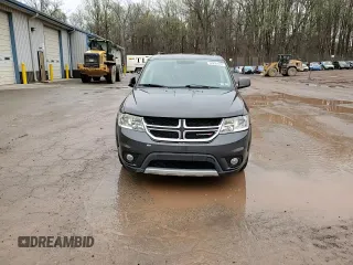 2016 Dodge Journey SXT with VIN 3C4PDDBG8GT242018, listed as a Copart auction lot 52899665 with 132,567 mi miles and Salvage Title. Bid and sale history available at DreamBid. Image 14.