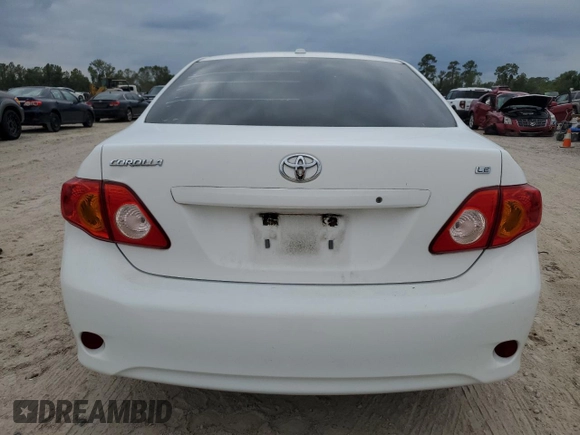 2010 Toyota Corolla with VIN 1NXBU4EE7AZ256666, listed as a Copart auction lot 79097074 with 65,537 mi miles and Salvage title. Bid and sale history available at DreamBid. Image 6.