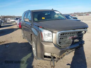 2015 GMC Yukon SLE with VIN 1GKS1AKCXFR712897, listed as a IAAI auction lot 41357889 with 1 mi miles. Bid and sale history available at carsss.com. Image 1.