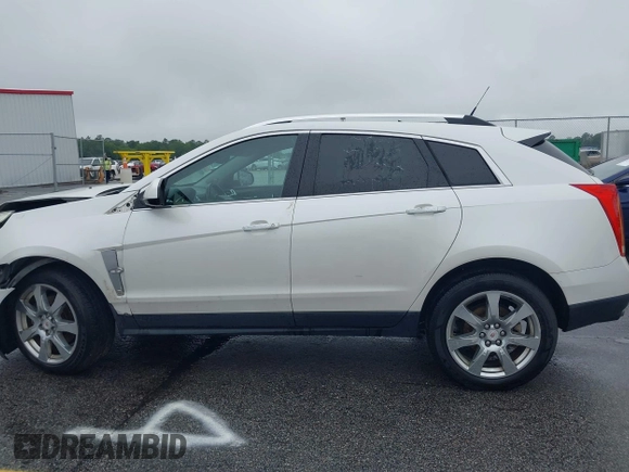 2012 Cadillac SRX Performance Collection with VIN 3GYFNBE38CS547423, listed as a IAAI auction lot 42276365 with 157,786 mi miles and . Bid and sale history available at DreamBid. Image 14.