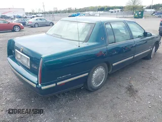 1999 Cadillac DeVille DHS z VIN 1G6KE54Y9XU766791, wystawiony jako IAAI lot #42005553 z przebiegiem 140 515 mil mil oraz . Historia ofert i sprzedaży dostępna na DreamBid. Obrazek 4.