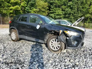2015 Mazda CX-5 Touring with VIN JM3KE4CY4F0474732, listed as a Copart auction lot 53435334 with 134,631 mi miles and Salvage Title. Bid and sale history available at carsss.com. Image 4.